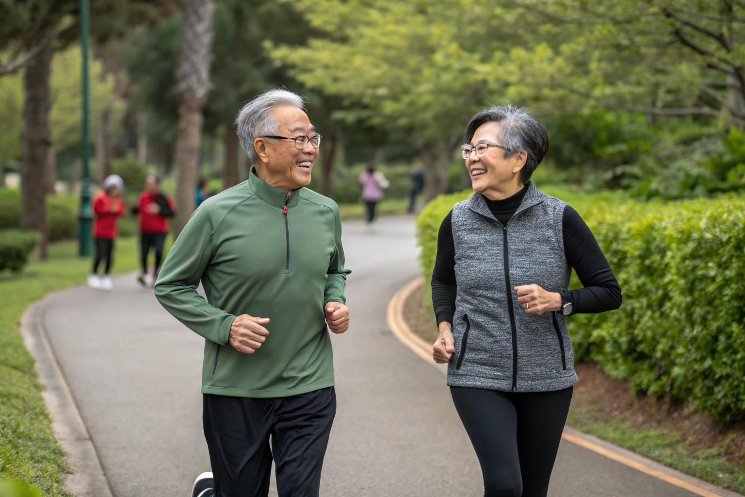 a joyful elderly couple is jogging together