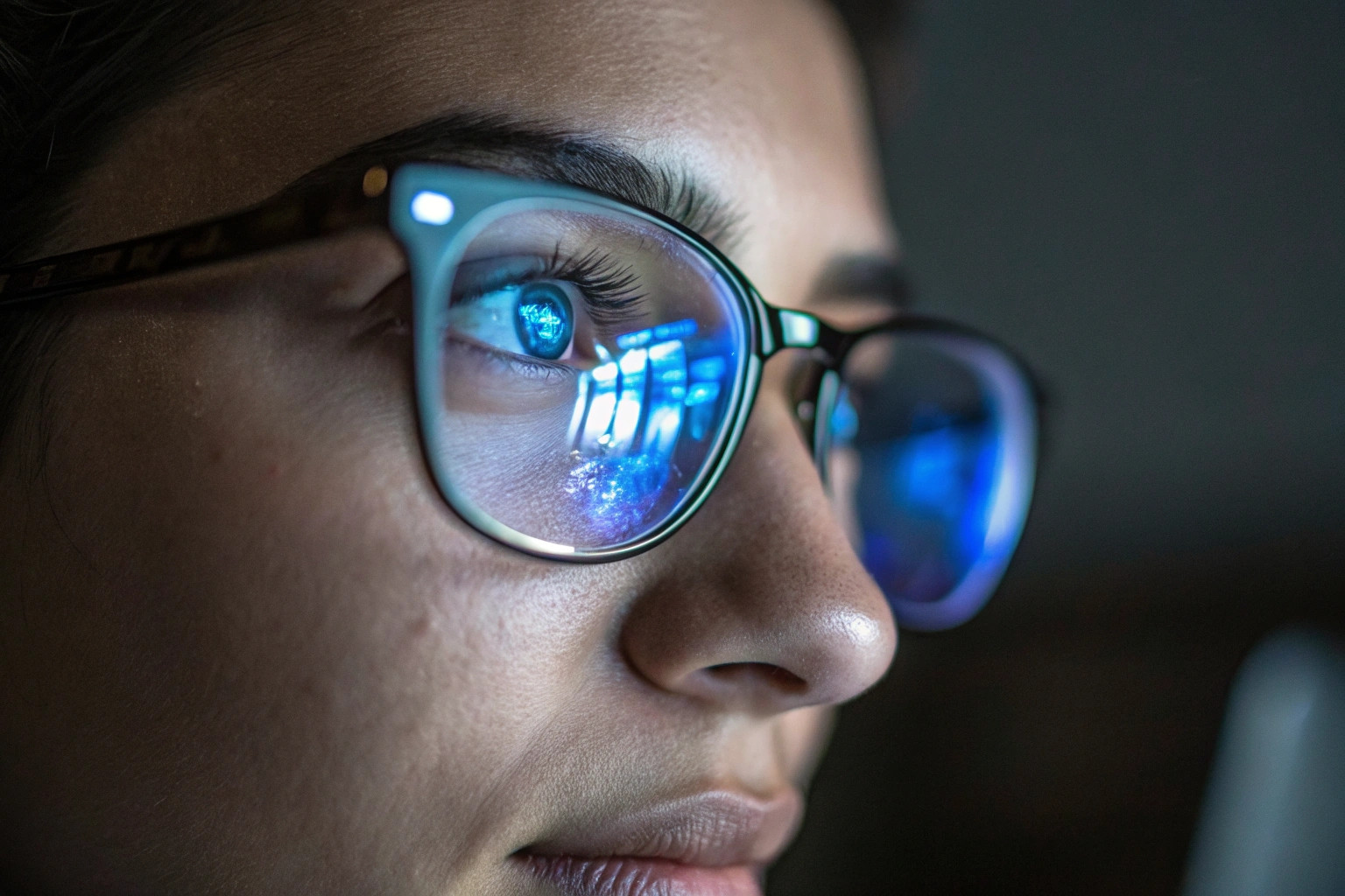 close up of person face wearing glasses