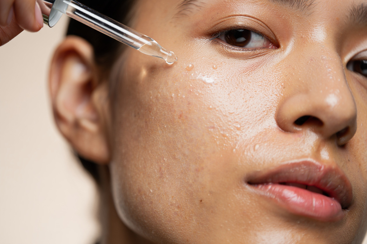 close up shot of serum application on dry skin